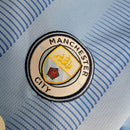 Conjunto Infantil Manchester City I - 2023/24 Azul