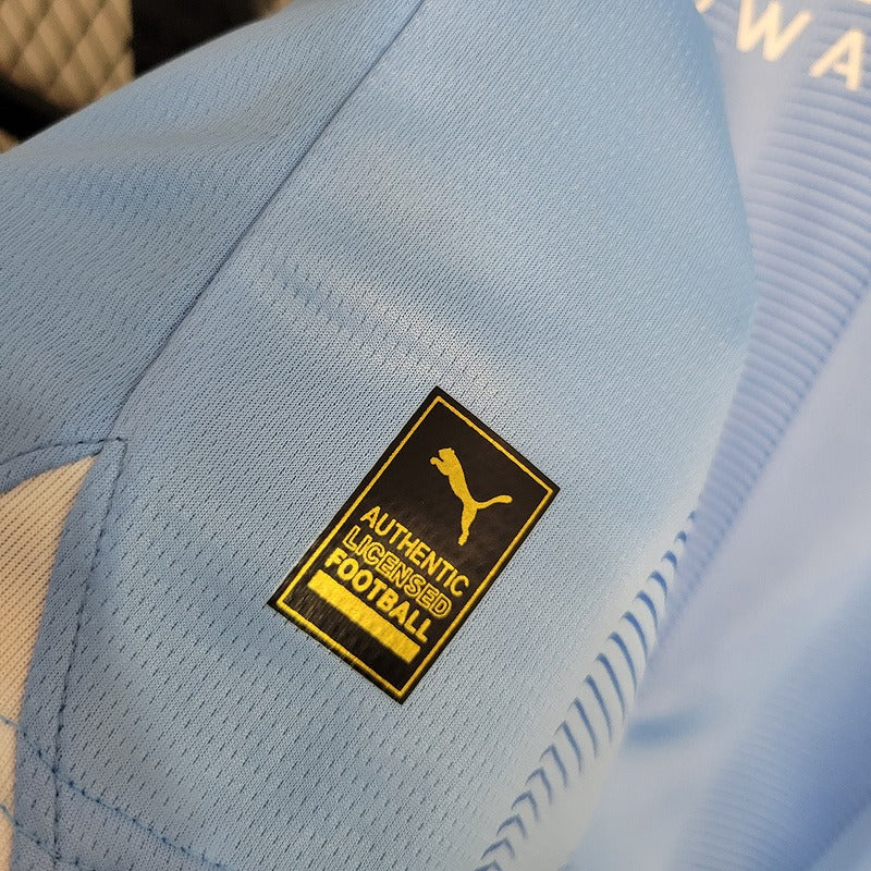 Conjunto Infantil Manchester City I - 2023/24 Azul